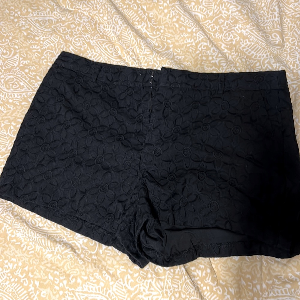 Black shorts with floral pattern